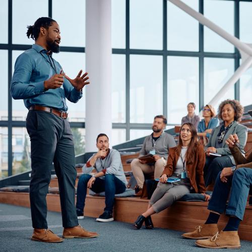 Man speaking to crowd